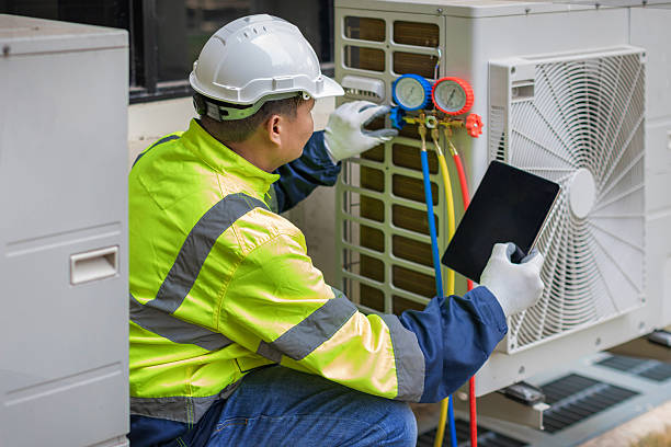 Professional Heat Pump Repair technician working in Williamston, MI